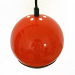 Small orange ES Horn Belysning of Denmark ball pendant spotlight, 1960s/70s  