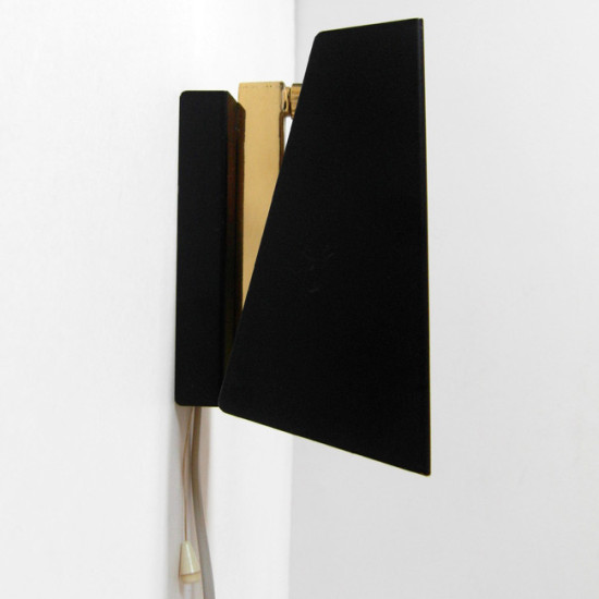 Matte black and brass clamshell wall light