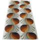 Bold geometric fabric with silver frond lozenges