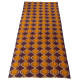 Crêpe textile with onion pattern in orange and browns